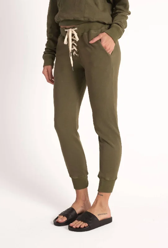 Bold color tight trousers for women with bright hues and daring style choices -Mila Jogger In Green