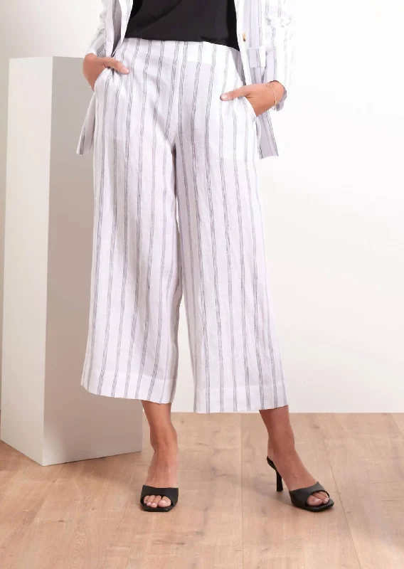 High-waisted tight trousers for women with flare leg and retro aesthetic -It's Only Natural Pant In White Linear