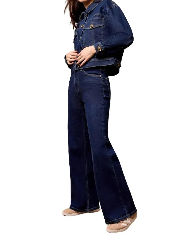 Tight trousers for men with tapered legs and sharp, tailored finish -Brooke Hugging Palazzo Jeans In Dark Denim