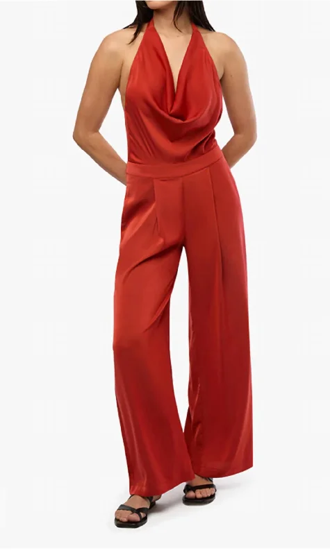 Fashion-forward tight trousers for women with metallic sheen and edgy design -Halter Jumpsuit In Red